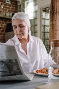 Woman Reading Newspaper