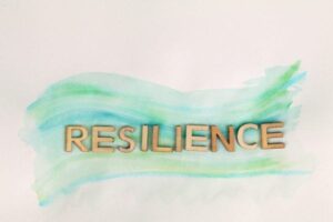 wooden letters spelling resilience